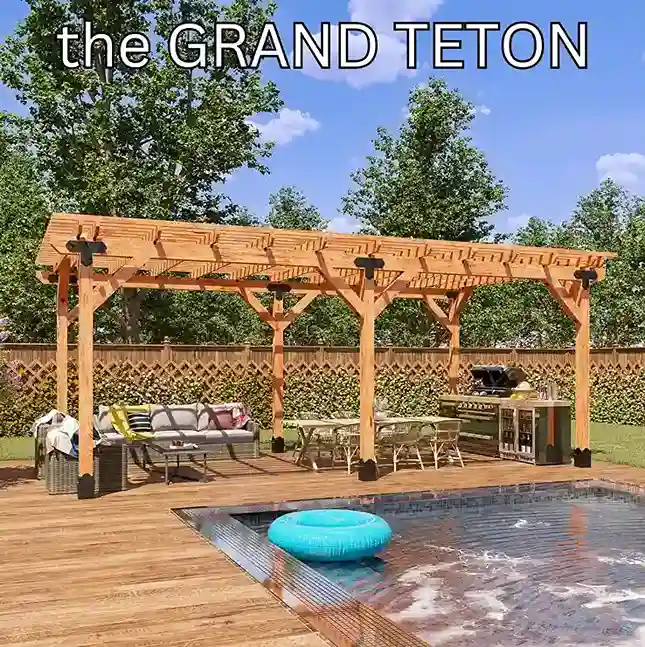 A long six-post cedar pergola on a timber pool deck, covering a sofa, a dining table and an outdoor bar, with a hedge and fence behind.