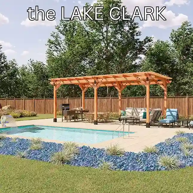 A long six-post cedar pergola running down one side of a swimming pool, covering a grill and lounge seating, with a board fence behind.