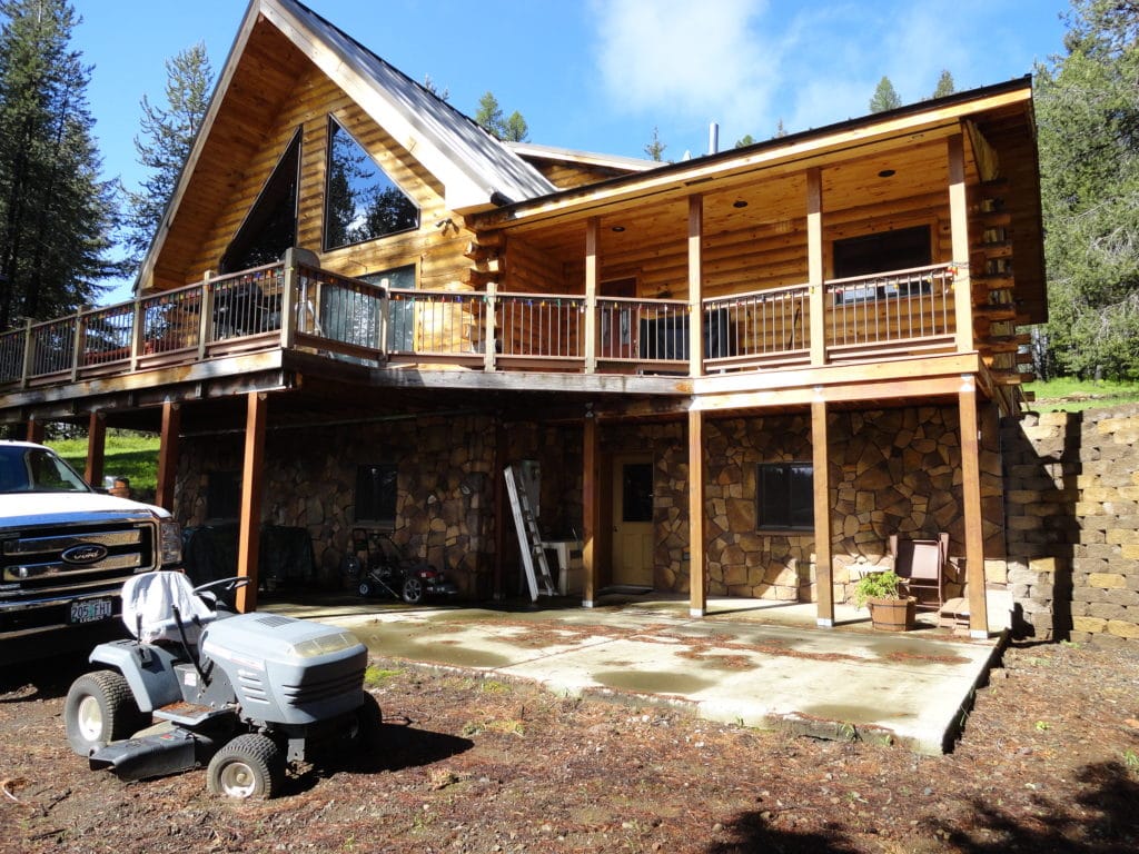 Front of El Dorado home with second story porch