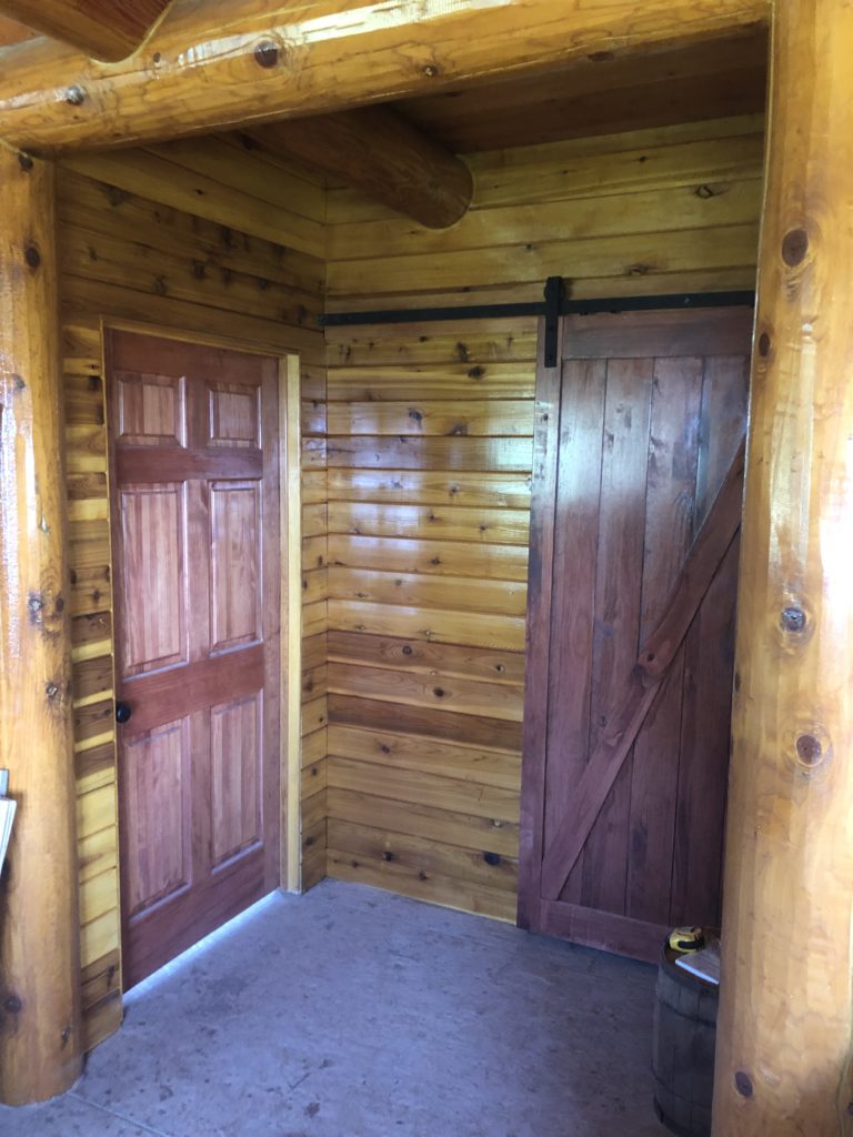 Lakeview interior doors and log wood walls