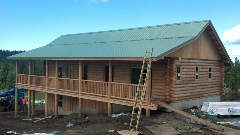 green shed scaled log home